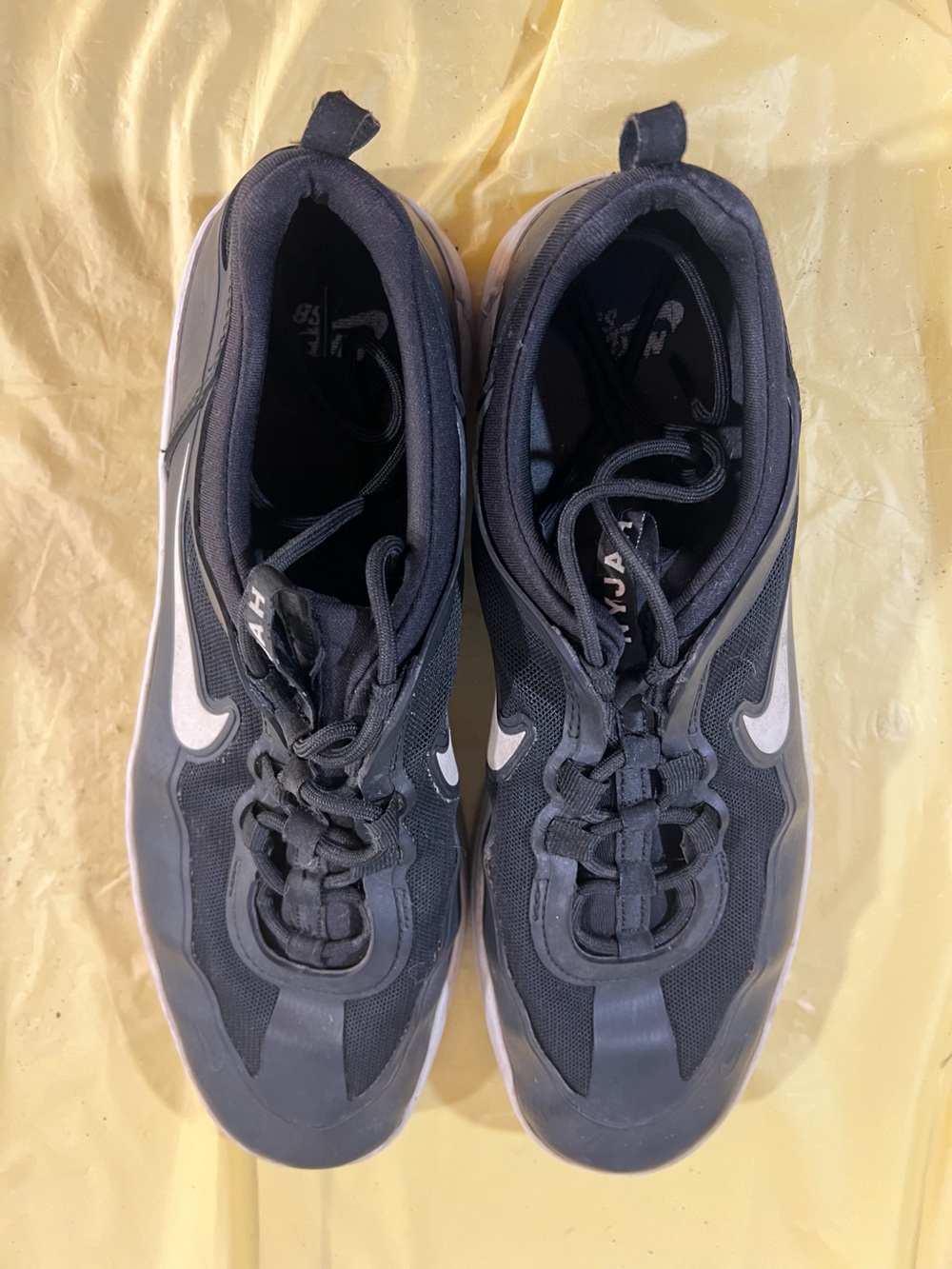 Nike Black Sneakers with White Swoosh Accent